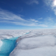 Surface meltwater runs across West Greenland’s Store Glacier in the summertime.